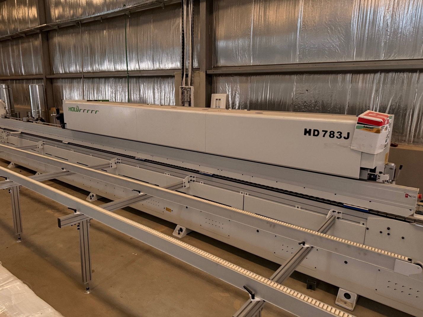 Straight & Bevel Edge Bander inside the production hall — Abaq Furniture factory, Riyadh